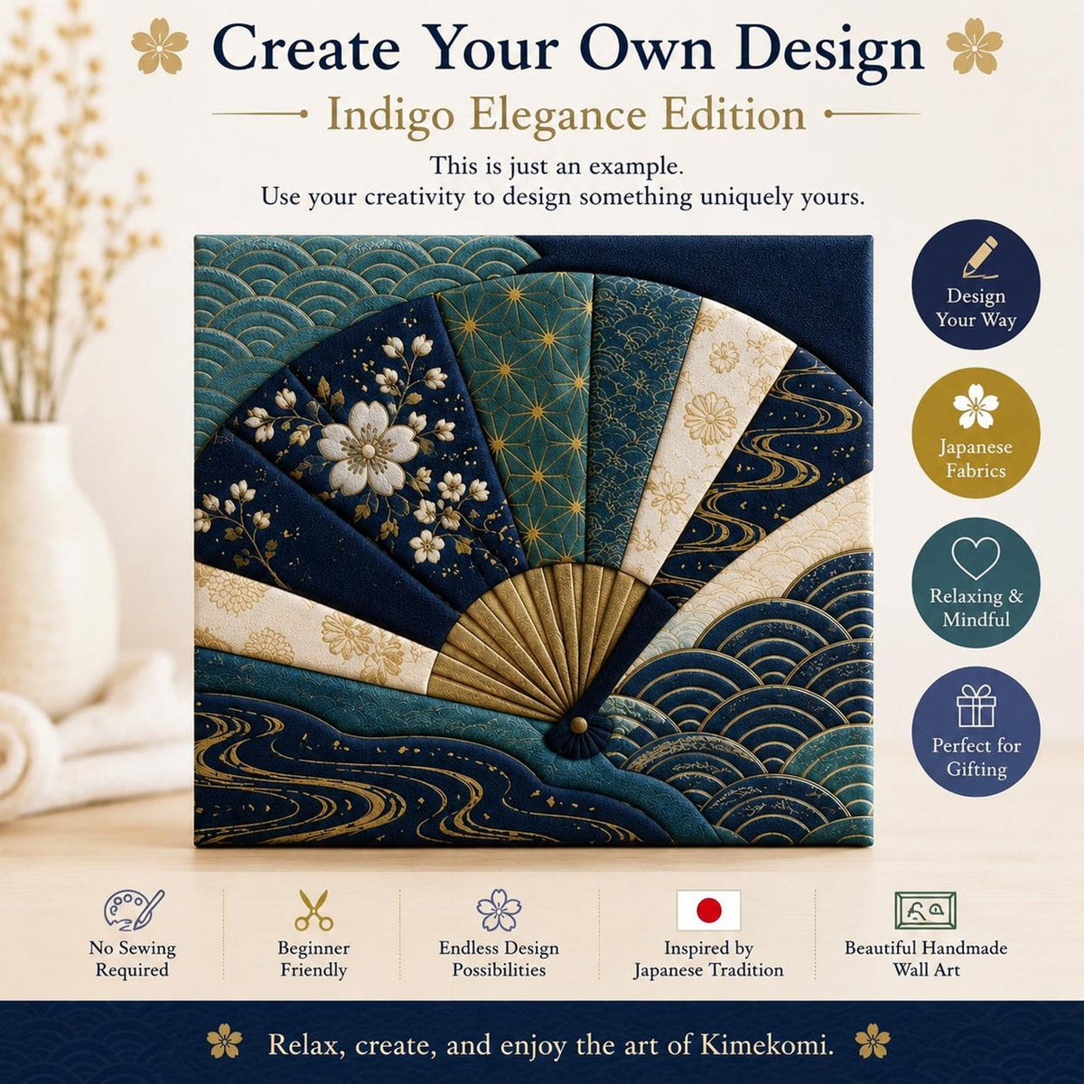 May include: A square Kimekomi craft kit featuring a fan design with indigo, teal, and cream fabric panels. The fan displays cherry blossoms, wave patterns, and gold geometric motifs. Text includes Create Your Own Design, Indigo Elegance Edition, and Relax, create, and enjoy the art of Kimekomi.