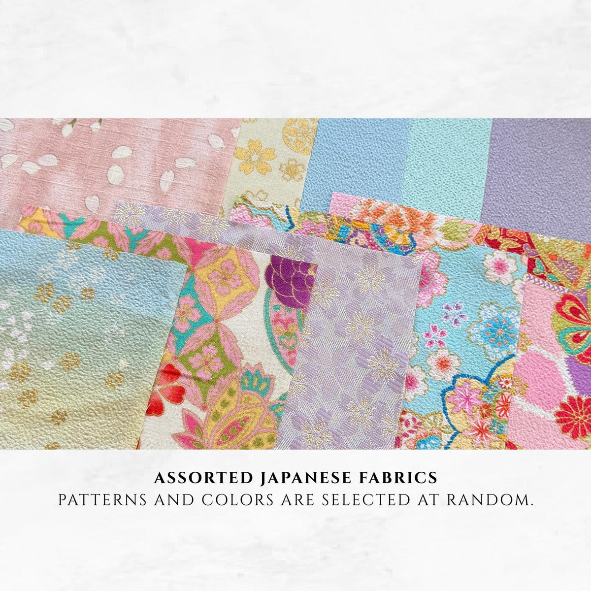 May include: A collection of assorted Japanese fabrics featuring various floral and geometric patterns in shades of pink, blue, green, purple, and gold. The text below reads: ASSORTED JAPANESE FABRICS. PATTERNS AND COLORS ARE SELECTED AT RANDOM.